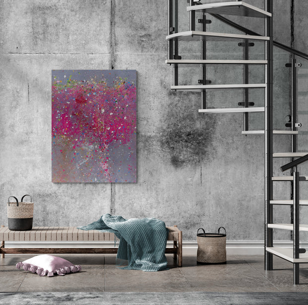In-situ view of "Kynance Cove" by Damien Hirst showing vibrant pink abstract art on textured grey wall in modern interior.