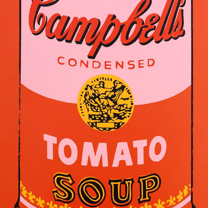 Detailed view of “Colored Campbell's Soup - Peach” by Andy Warhol, pop art silkscreen print with vibrant pink and red tones.