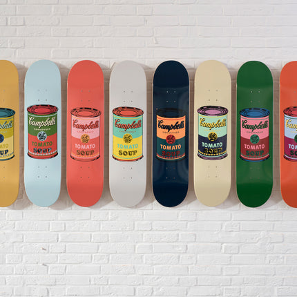 Set of 8 Colored Campbell's Soup skateboards by Andy Warhol in vibrant pop art style with digital print on display