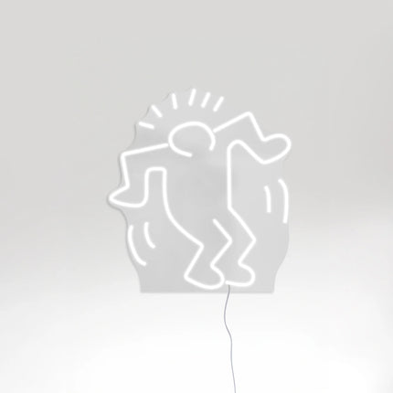 Contemporary neon lamp featuring Keith Haring’s “Dancing Man YP x Keith Haring” design with illuminated outline detail.