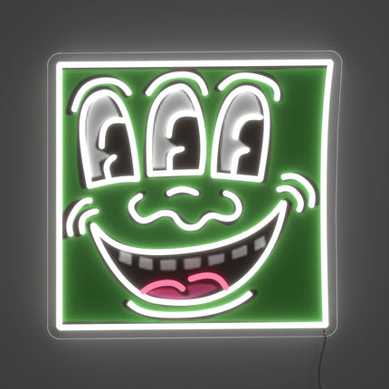 Neon lamp artwork "Triple Eyes YP x Keith Haring" by Keith Haring with three eyes and a smiling face on green background full artwork view