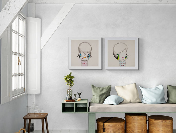 In-situ view of “Once in my life (diptych)” by Javier Calleja, contemporary portraits in a minimalist living room setting.